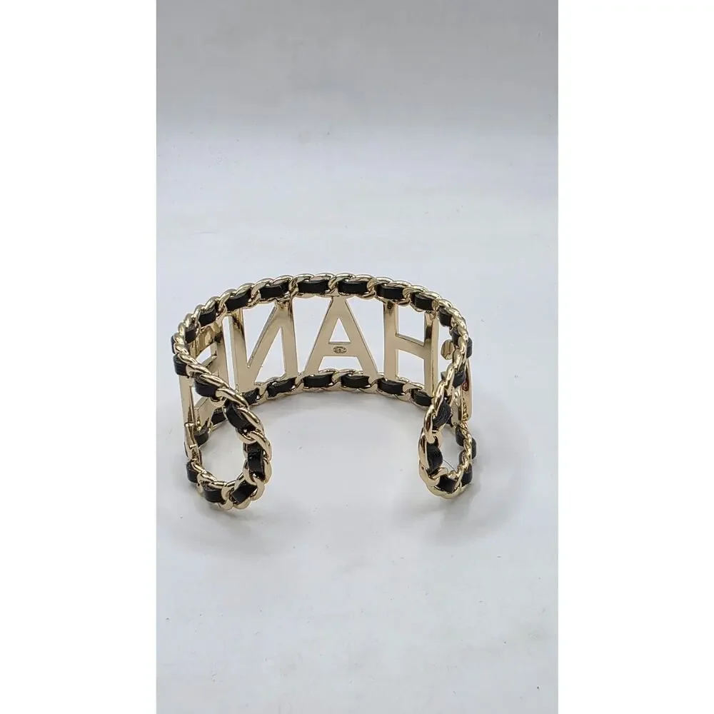 Chanel Gold-tone Leather 'CHANEL' Cuff Bracelet